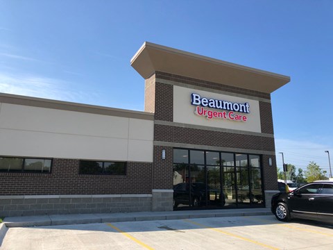 The front of a building with the words "Beaumont Urgent Care" on it.