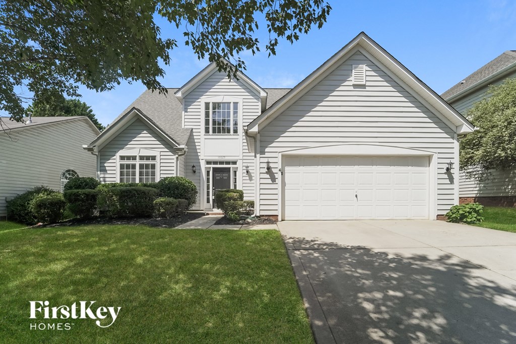 A house with a garage is for sale by FirstKey Homes.