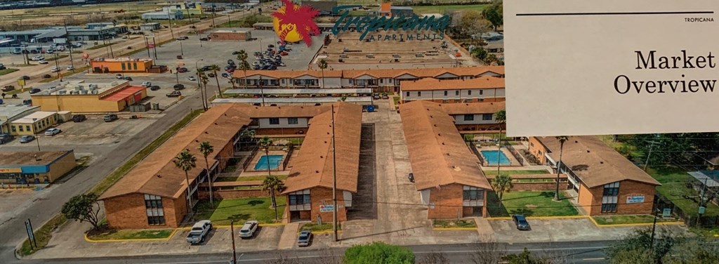 an aerial view of a market overview of a city street and buildings