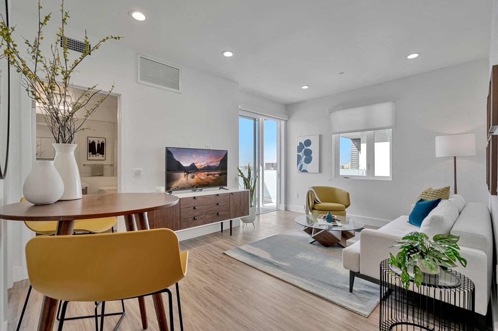 a living room with a couch and a table