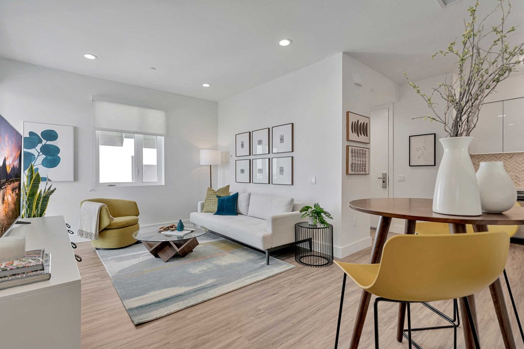a living room with a couch and a table