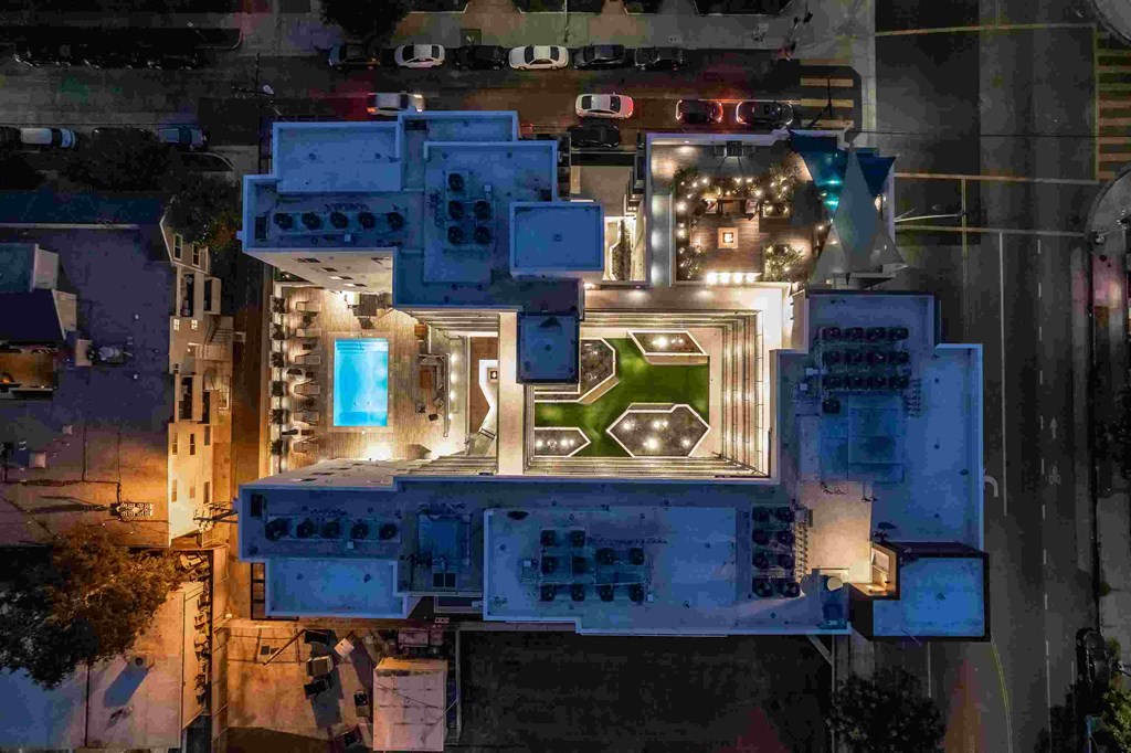 an aerial view of a building at night