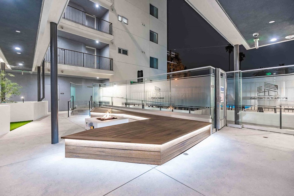 a hot tub sits in the middle of a room in an apartment building