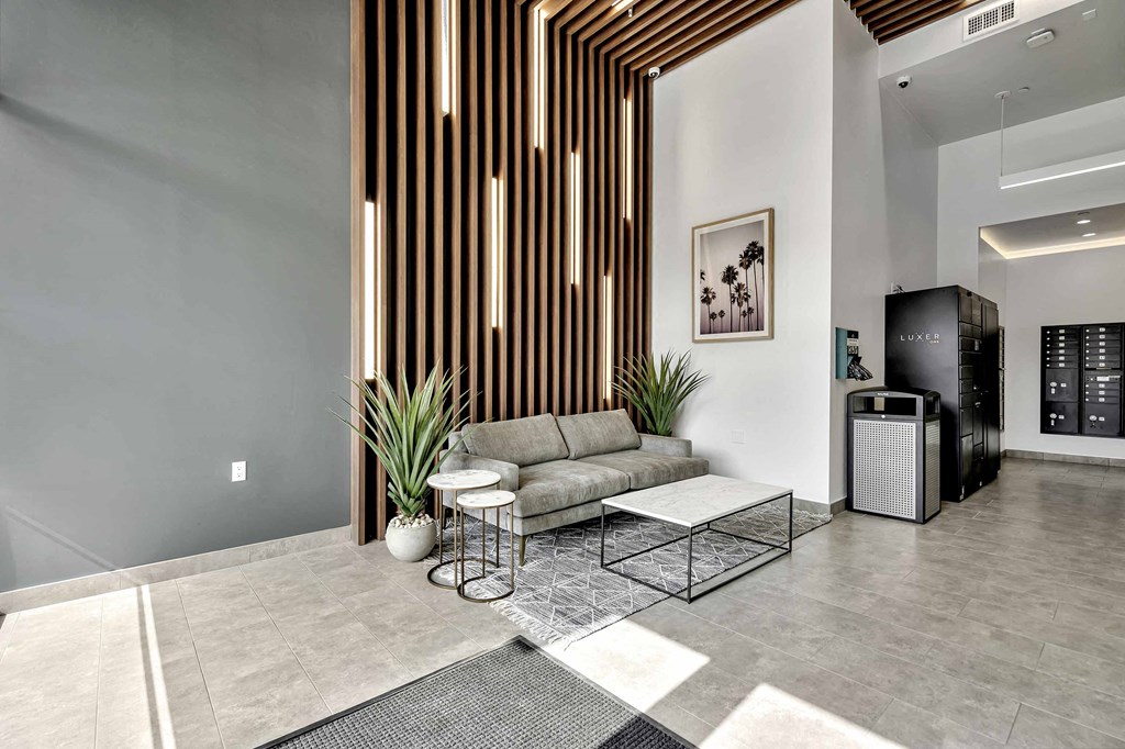 a living room with a couch and a table