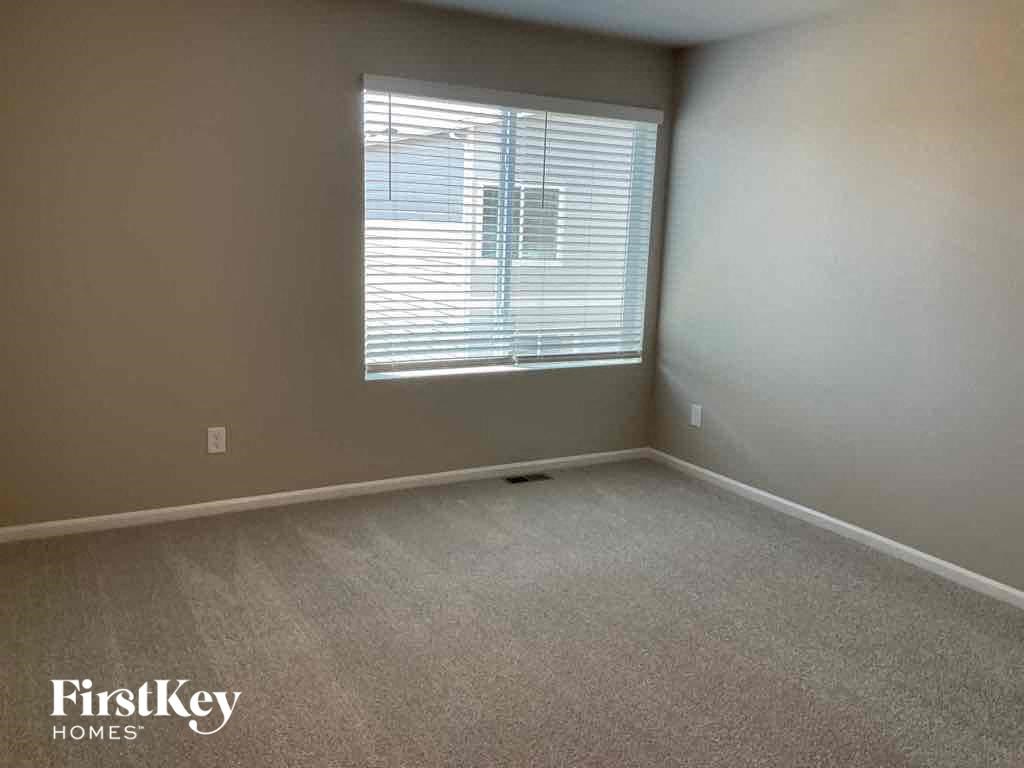 an empty room with a window in it