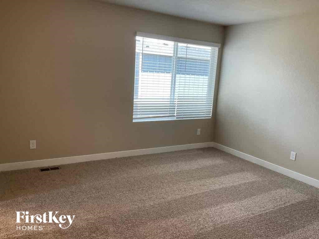 an empty room with a window in it