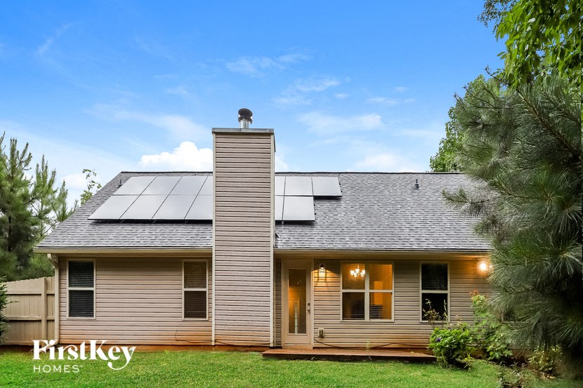 a house with solar panels on the roof