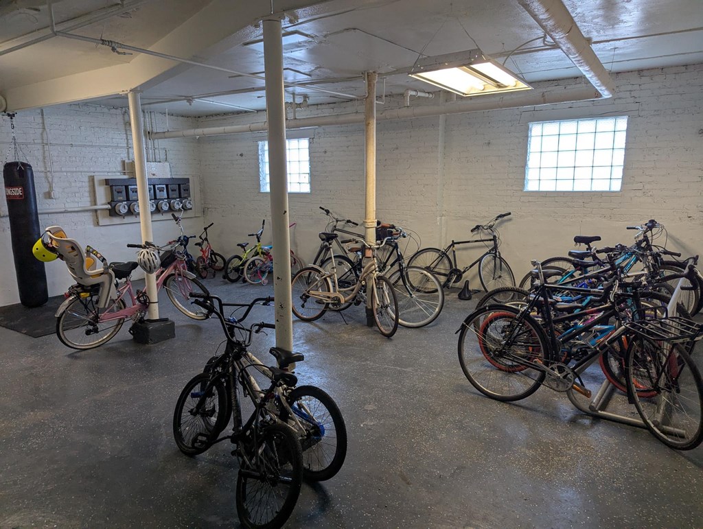 A room full of bicycles is shown.