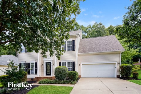 A house with a garage is for sale by FirstKey Homes.