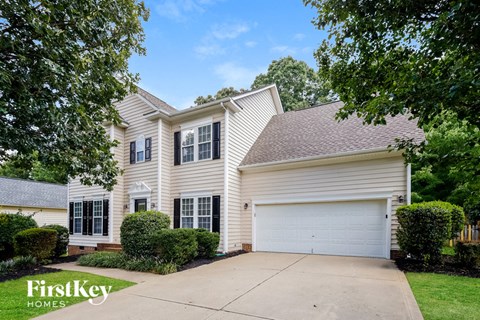 A house with a garage is for sale by FirstKey Homes.