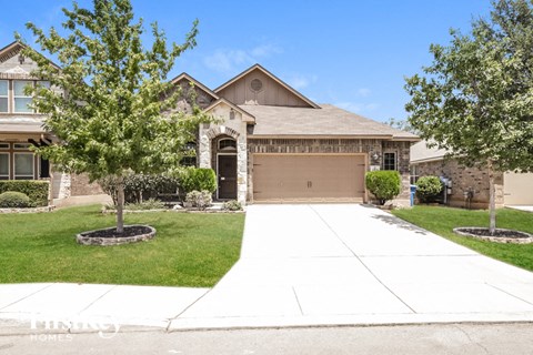 a large house with a driveway in front of it