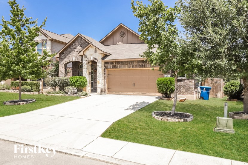 a house with a driveway and a garage door