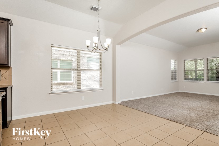the living room and dining room are spacious and open to the kitchen
