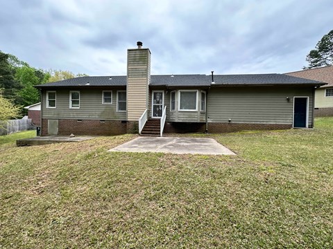 a house with a yard in front of it