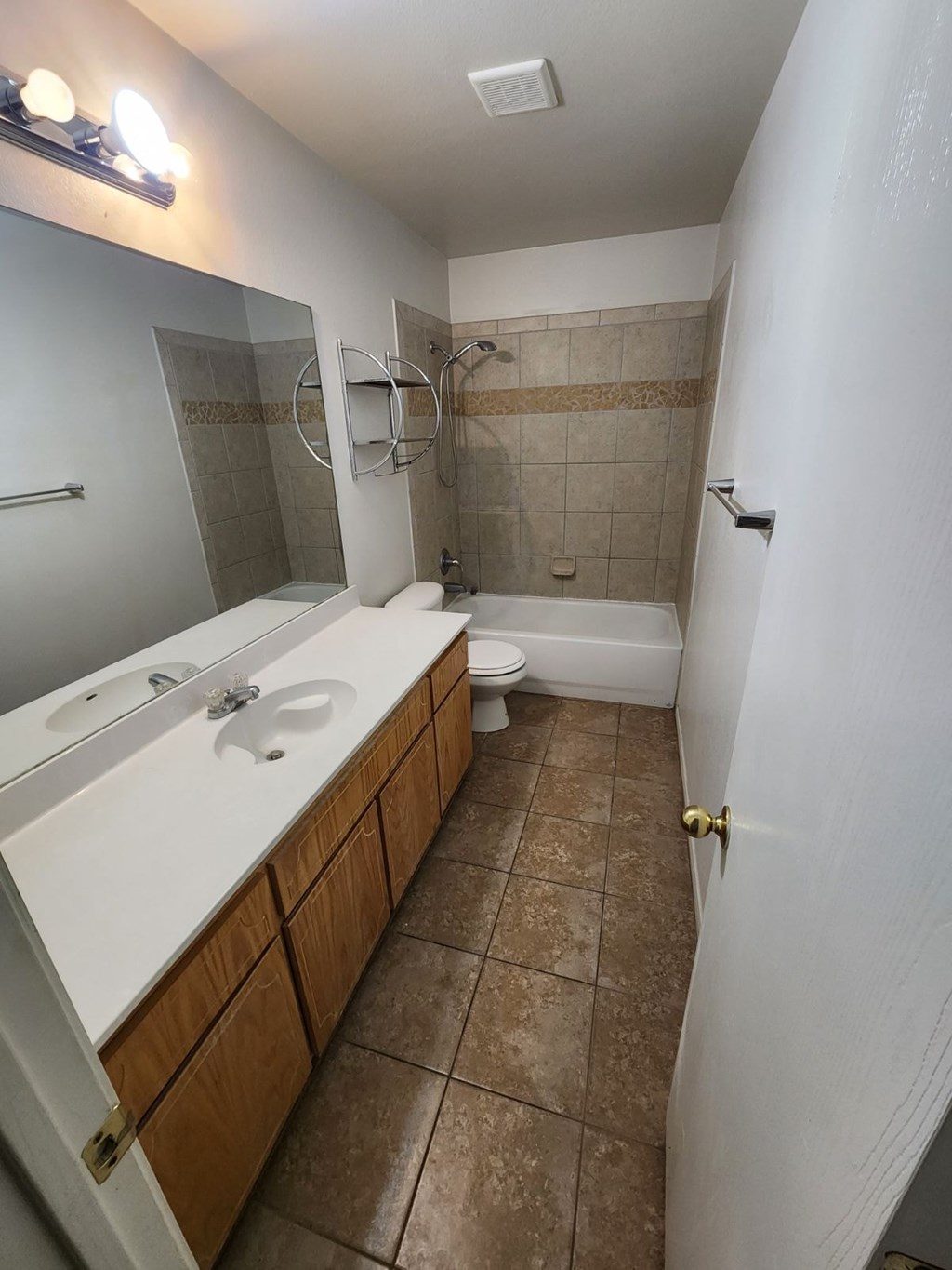 a bathroom with a sink and a toilet