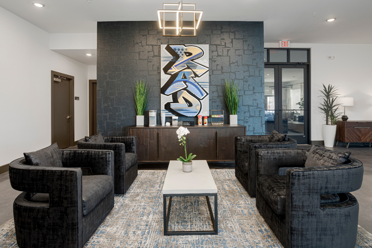 a living room with couches and a coffee table