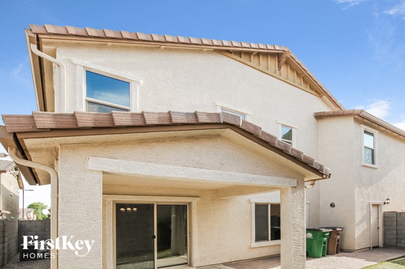 a white house with a roof and a door