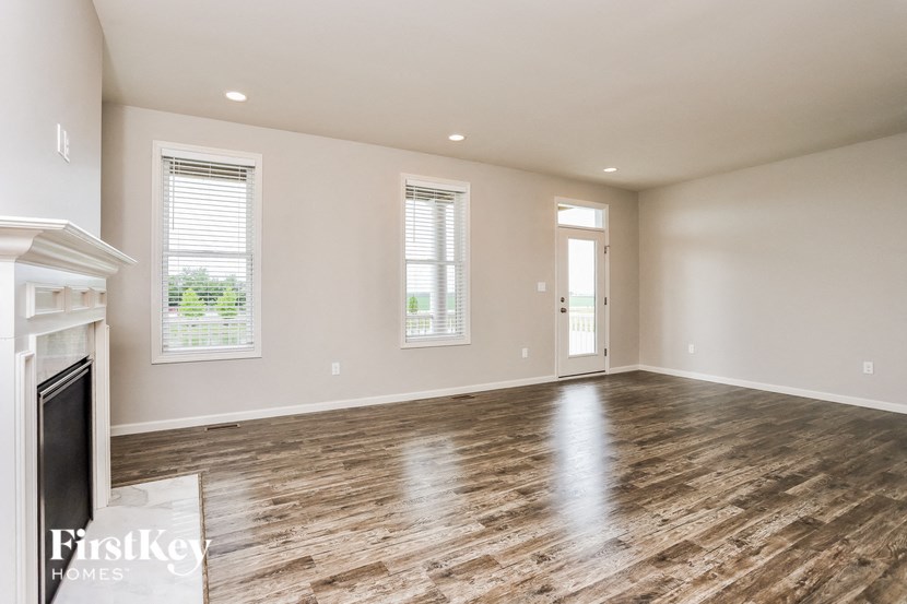 the living room is clean and ready for us to move in