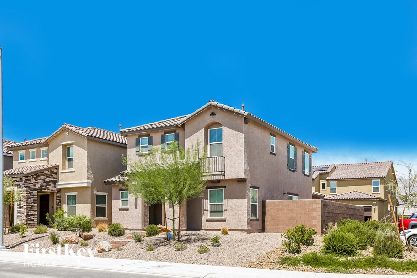 a large house with a street in front of it