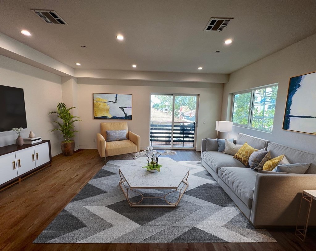 a living room with a couch and a table