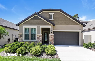 a house with a driveway and a garage door