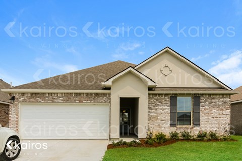 a house with a car parked in front of it