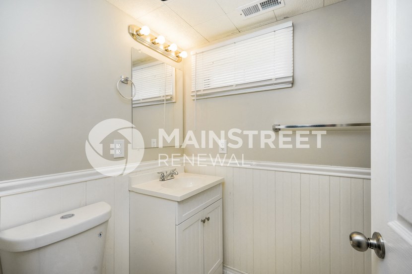 a small bathroom with a toilet and a sink