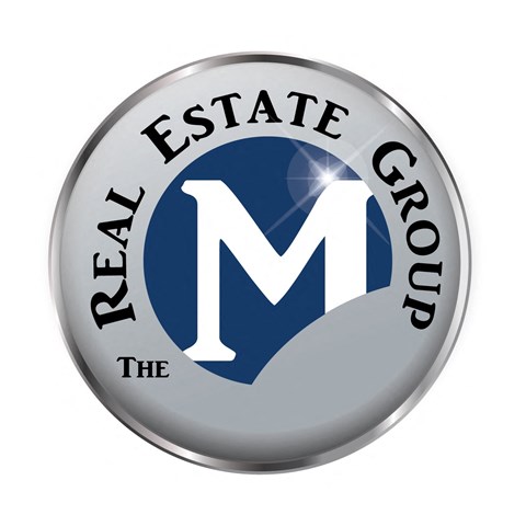a blue and silver circle with the middle of the logo for the middle east group