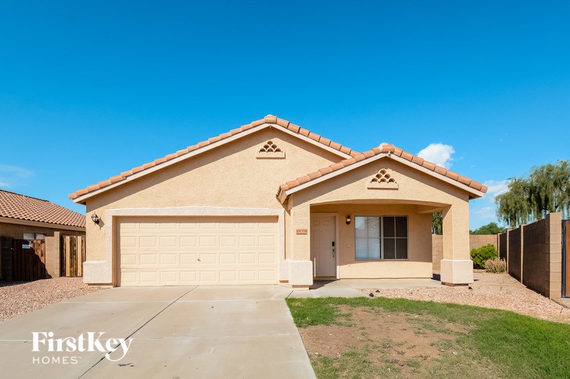 A house with a garage is for sale by FirstKey Homes.