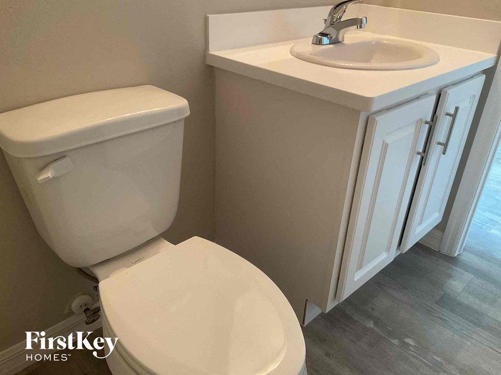 a small bathroom with a toilet and a sink