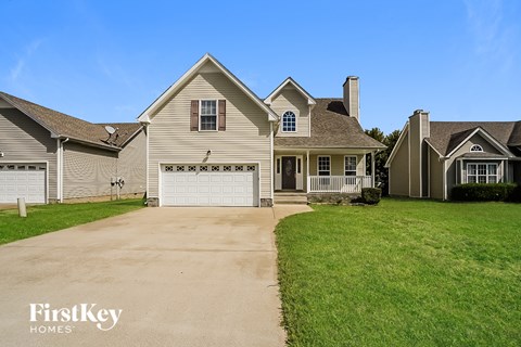 A house with a garage is for sale by FirstKey Homes.