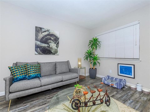 a living room with a couch and a table