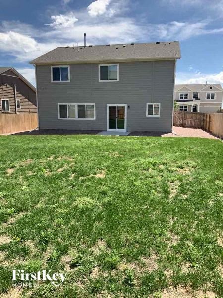 a house with a yard in front of it