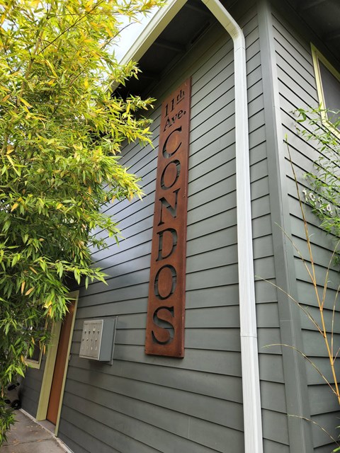 A sign on a building that says "I love DOGS".