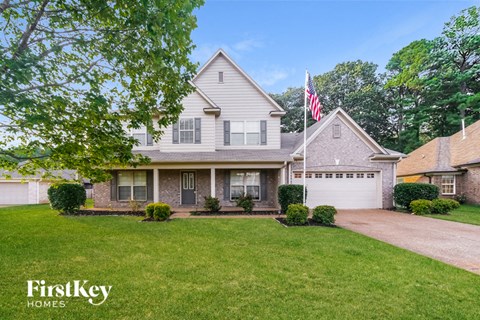 a house with an flag in front of it