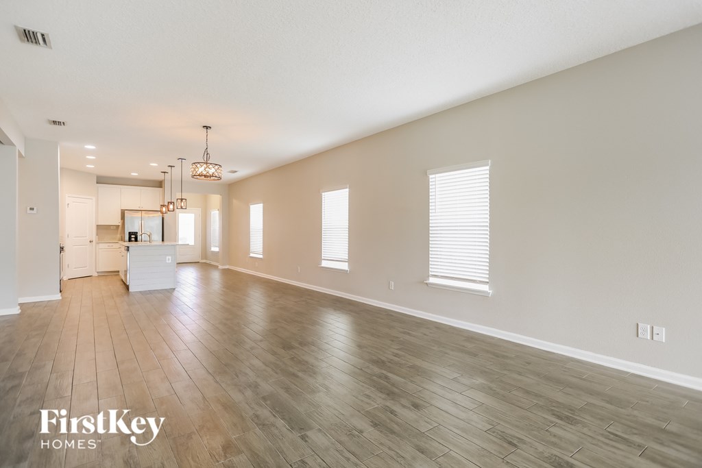 the living room and dining room are spacious and open to the kitchen