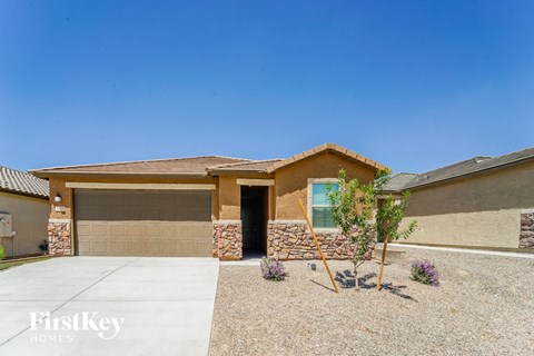 a house with a driveway and a garage door