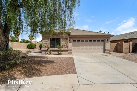 a house with a driveway and a garage door
