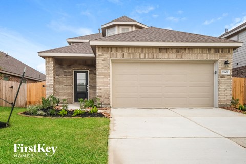 A house with a garage door that says FirstKey Homes.