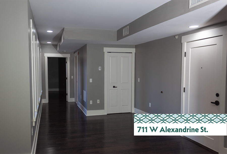 A hallway with doors on either side and a text overlay at the bottom.