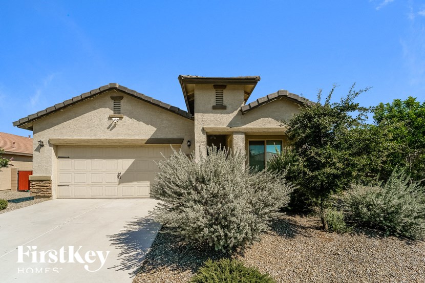 a house with a driveway and a garage door