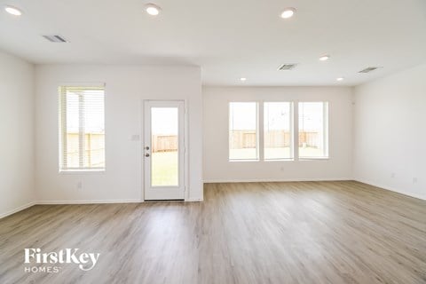 the living room is clean and ready to be used as a home office