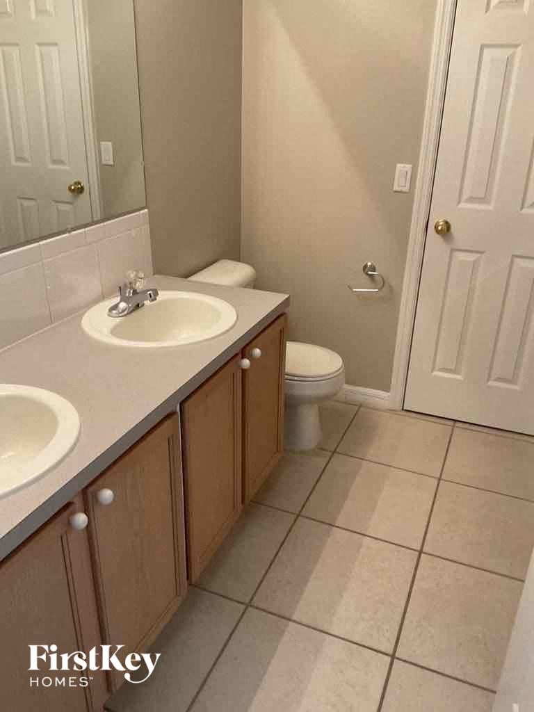 a bathroom with a sink and a toilet
