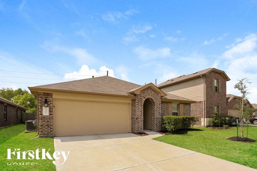 a house with a garage and a lawn
