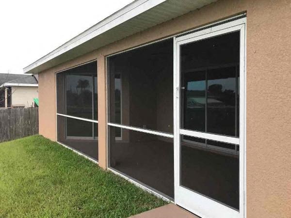 A house with a white door and window.