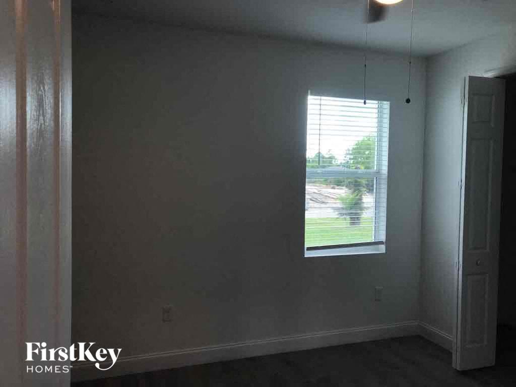 an empty room with a window in it