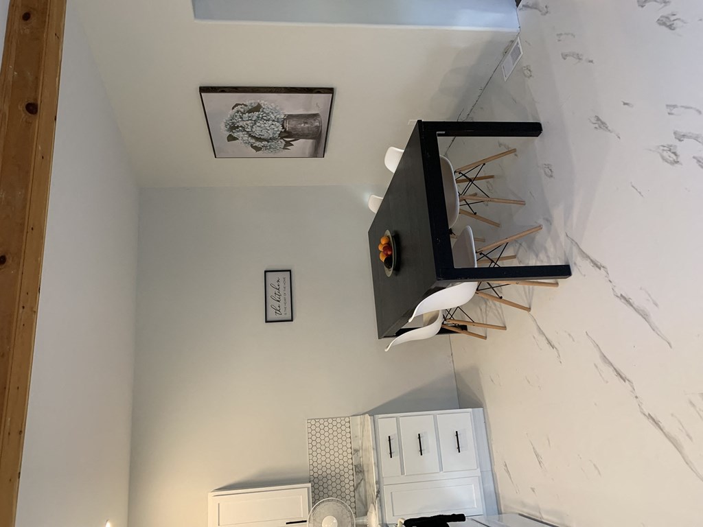 a view of the living room from the loft