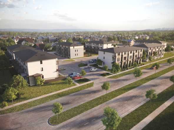 an aerial view of an urban neighbourhood with houses and cars