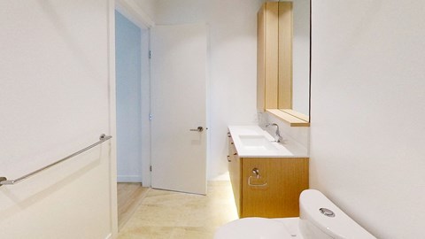 a bathroom with a toilet and a sink