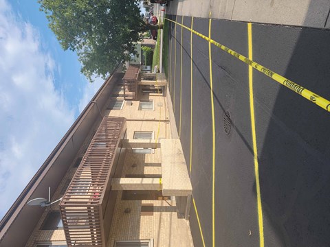 a row of stairs on the side of a building with caution tape